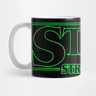 Stay Strange Green Mug